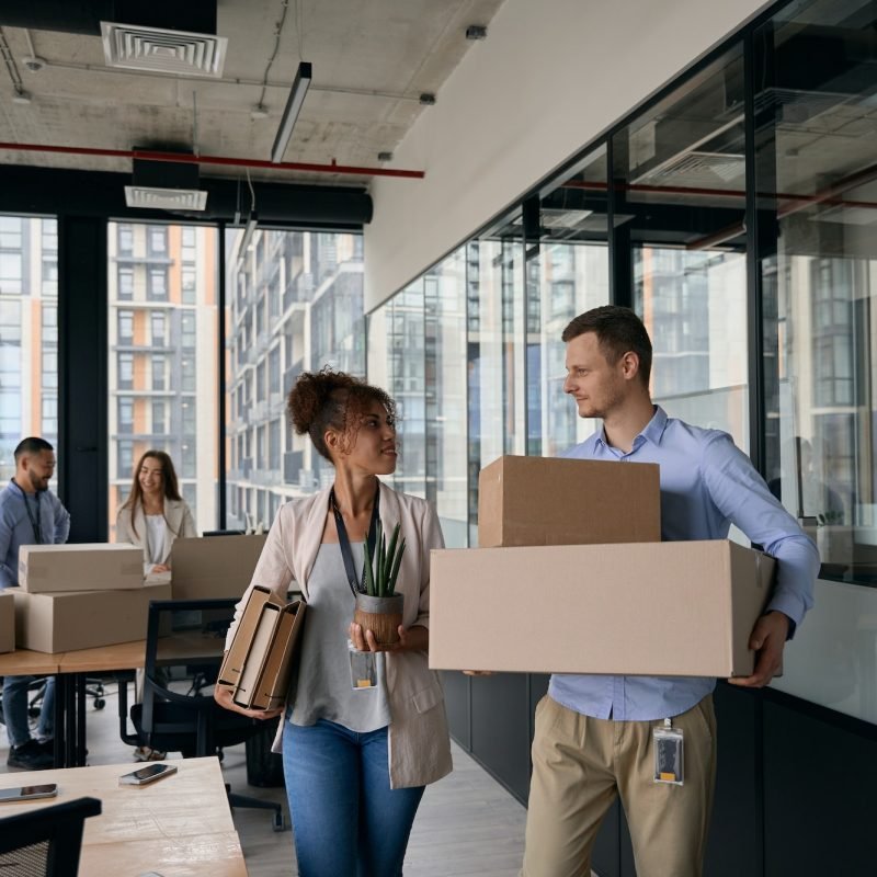 young-company-employees-preparing-for-office-moving.jpg